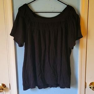 Black short sleeve blouse.